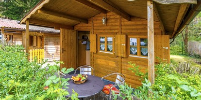 Campingplätze - Bootsverleih - Franken - Für etwas mehr Komfort bieten wir u.a. unsere Blockhütten an. - Camping Waldsee 